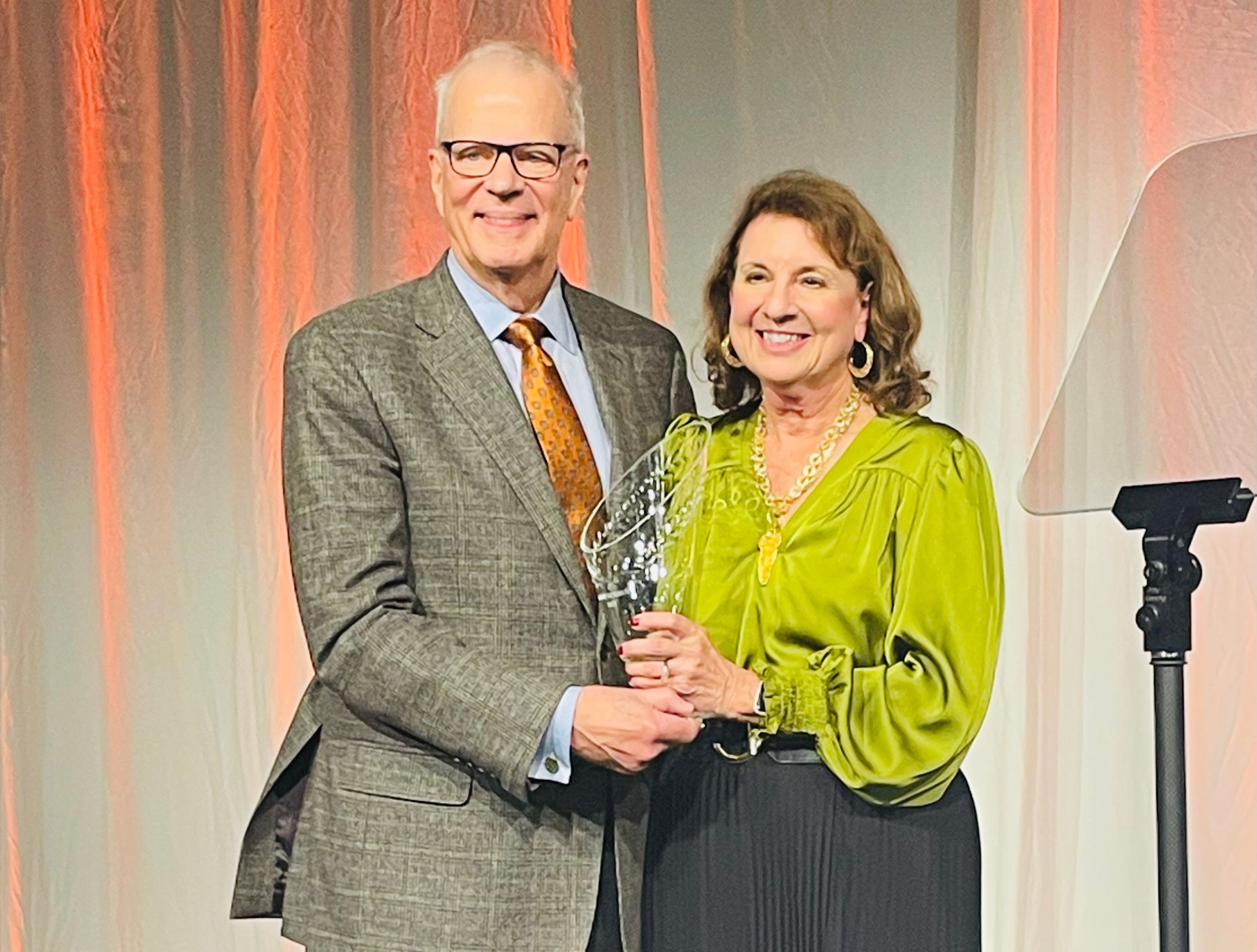 GCF Board Member, John Domaschko, with 2025 Bridge Builder recipient Jeanne Schroer.