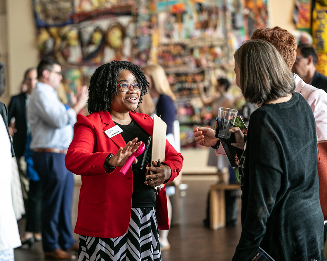 Tara interacting with nonprofit leaders.
