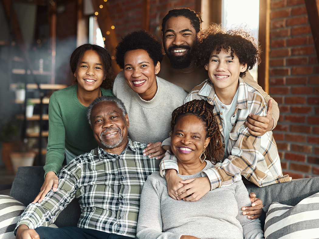 Multigenerational family sitting on a couch
