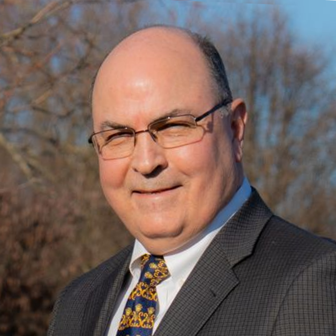 Headshot image of John Grove