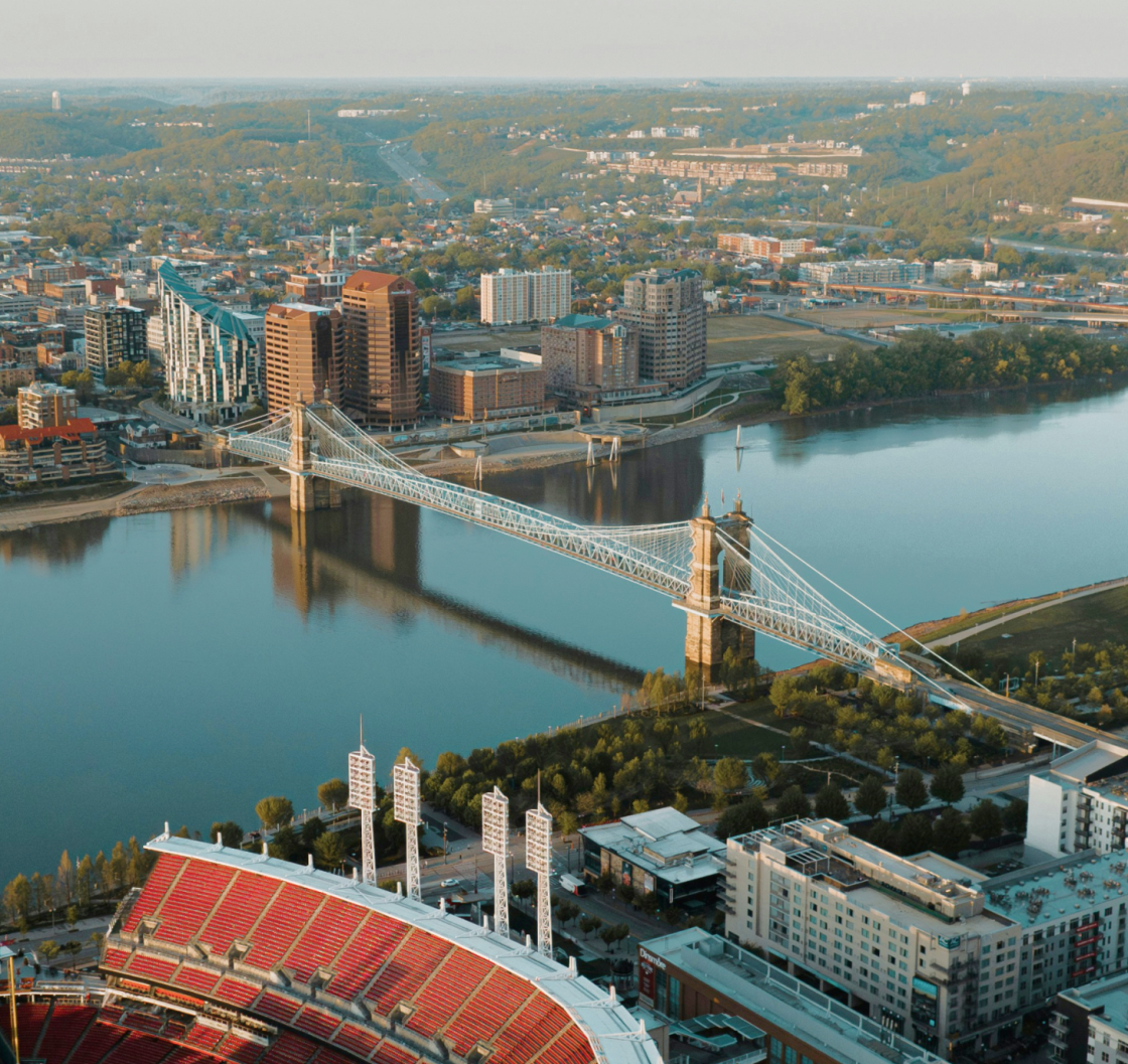 Aerial view of Cincinnati suspension bridge spanning a wide river