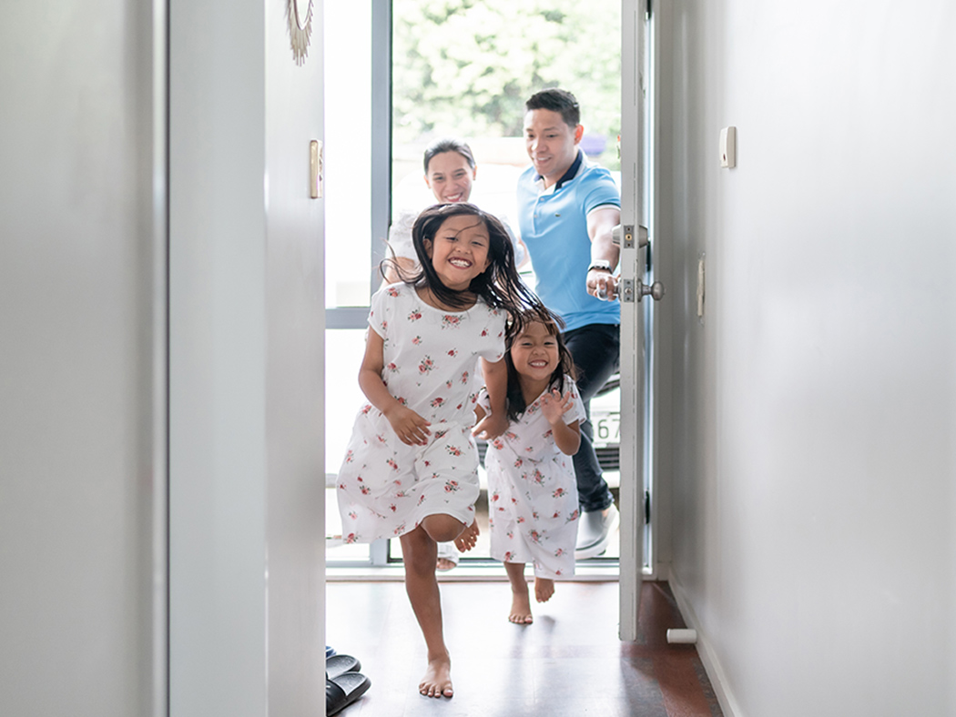 Girls running into new home