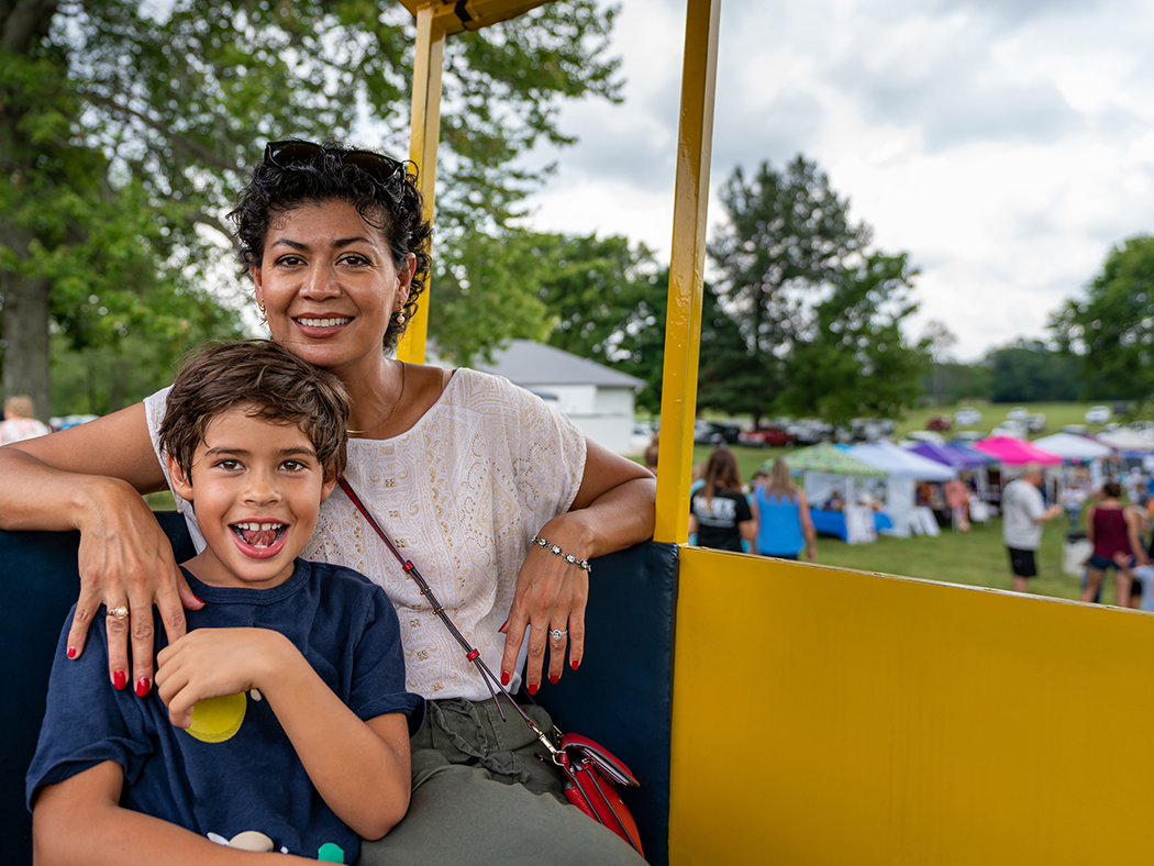 Mom and son at community event